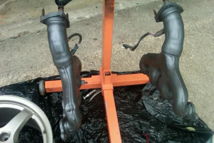 Rafael originally thought he was going to install these stock C5 exhaust manifolds.
