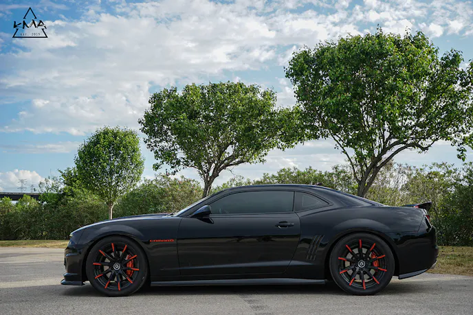From the side, Krisitn's 2010 Chevy Camaro 2SS looks pretty stock, except for the Inferno Orange calipers.