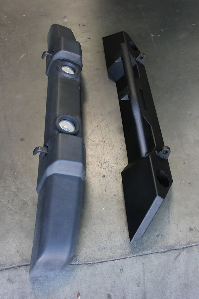 The stock front bumper is the first piece we're sending to the dumpster. Seeing the two parts side by side the benefits of the Extreme Terrain's heavy duty construction are obvious. Its enhanced features, which include the ability to add a 12,000-pound lb. winch, will likely come in handy out on the trail.