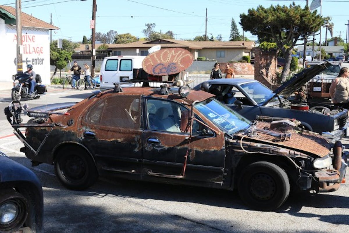 At some point in time, this one appears to have been a mid-90s Nissan Altima. It has since been transformed into this far more interesting specimen before you, though the suspiciously dubious nature of that center hood scoop might be a turnoff to some. Either way, any potentially points lost there are quickly regained with the hood-mounted horn system, full-sized pickup truck side mirrors, and the beefy push bar up front.