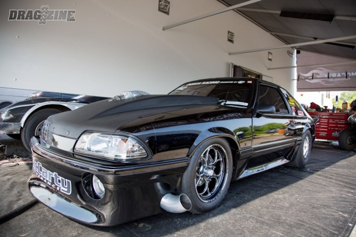 Jacky McCarty, the defending champion of the Prize Fight in X275, is back for another winners' belt this year. McCarty, still in NMCA Street Outlaw trim, unloaded right off the trailer with a 1.16 - 4.41 pass, and then swapped turbochargers and added weight to get in X trim, going a 4.55 in the mid-day 85-degree heat.