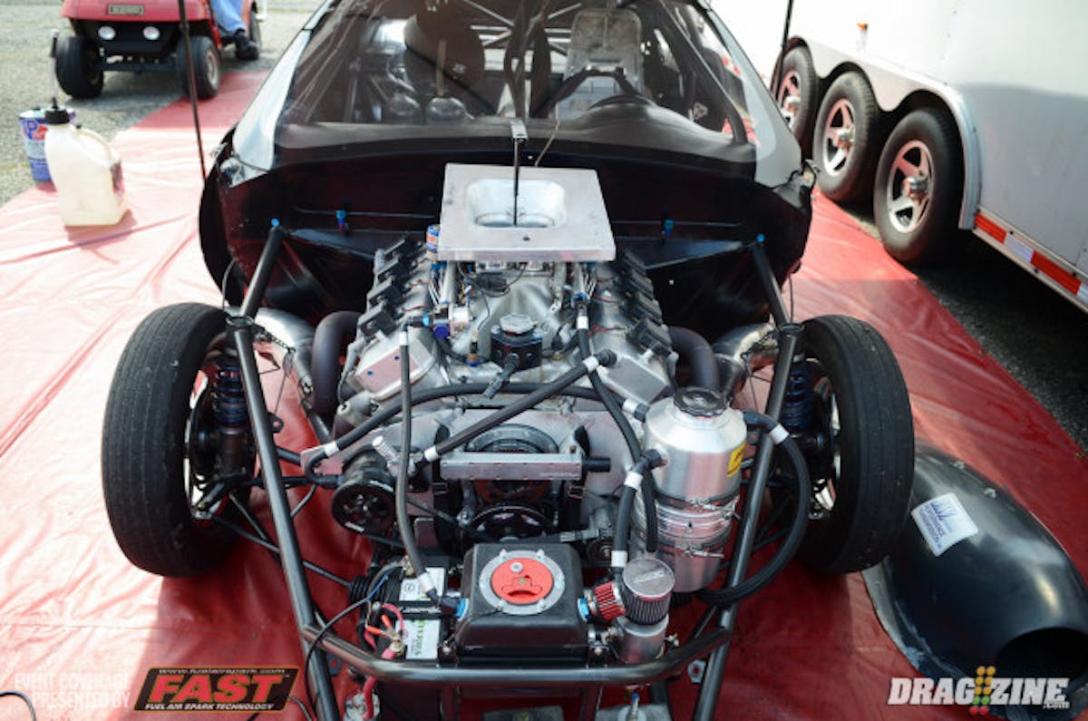 67-year old Joe Wallace is in  fifth in the Limited Drag Radial field with a stellar 4.37 for his nitrous-fed Chevrolet Camaro. The car sports a 619 cubic inch, BES-built big-block with conventional heads and a single cast intake, topped by an Accufab four-barrel 8500 throttle body. An NOS 3-stage dry nitrous system  provides the extra horsepower, with with fuel provided by Billet Atomizer injectors and the ignition from a coil-on-plug setup. The Wallace's, Joe and som and crew chief Tyler, have been running this car for more than a decade, with Tydo Race Cars handling the updates over the years to bring it to its current state. With a previous career best of 4.43, their 4.37 this weekend in uncharted territory for the pair.