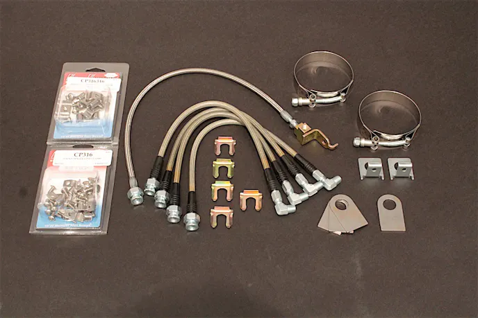 A look at the parts we sourced from Classic Performance Parts for this project. Here we've got AN stainless flex line (BHK-SAN), brake hose tabs (BHT), a stainless straight-line fit for GM vehicles (SLS-03), single and double-line clamps (CP316, CP316316), and 3/16 rear flex line kit (RSFLK-316).