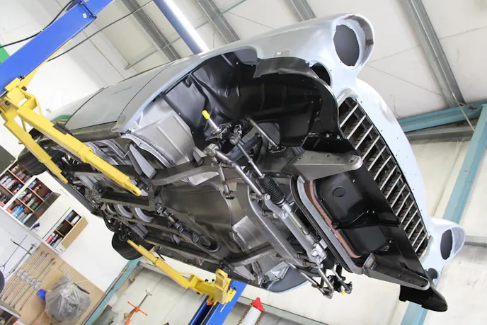 You can see how the new frame tucks up under the body.