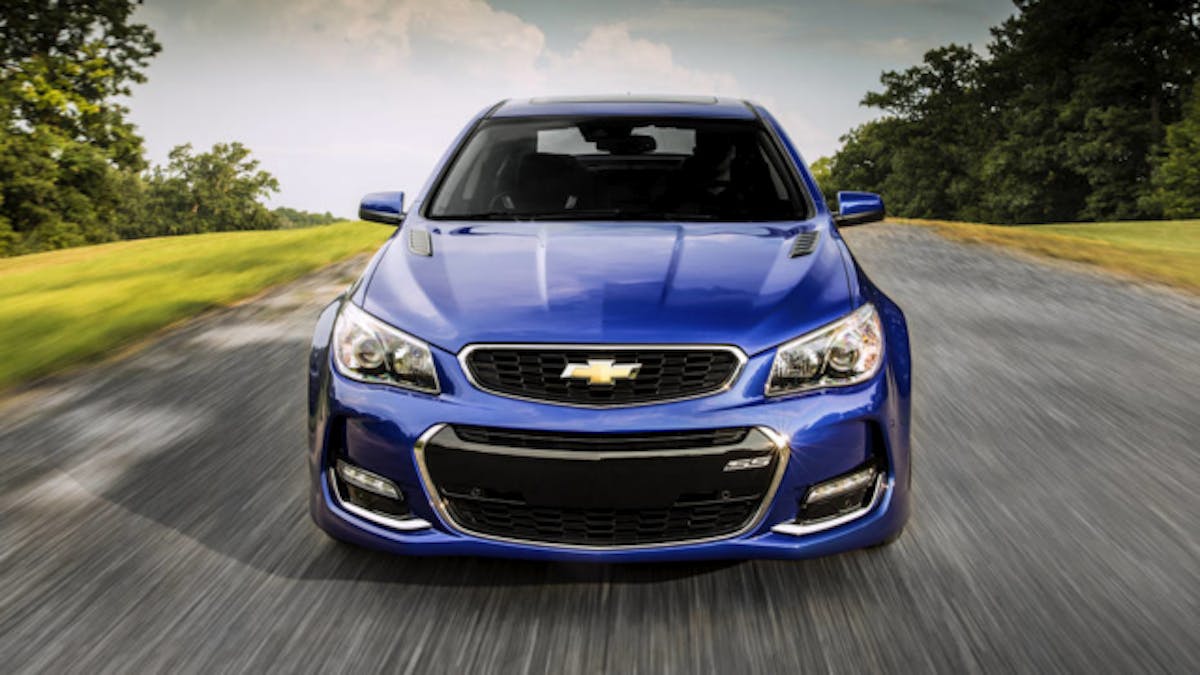 The 2016 Chevrolet SS sedan features several exterior enhancements that reinforce its commanding presence on the road. A revised front fascia features new, vertical ducts at the outer edges to direct airflow over the front wheel openings to improve aerodynamic efficiency. The fascia also incorporates new LED signature lighting, while new, functional hood vents and new-design 19-inch cast-aluminum wheels contribute to a stronger appearance for the rear-drive sports sedan.