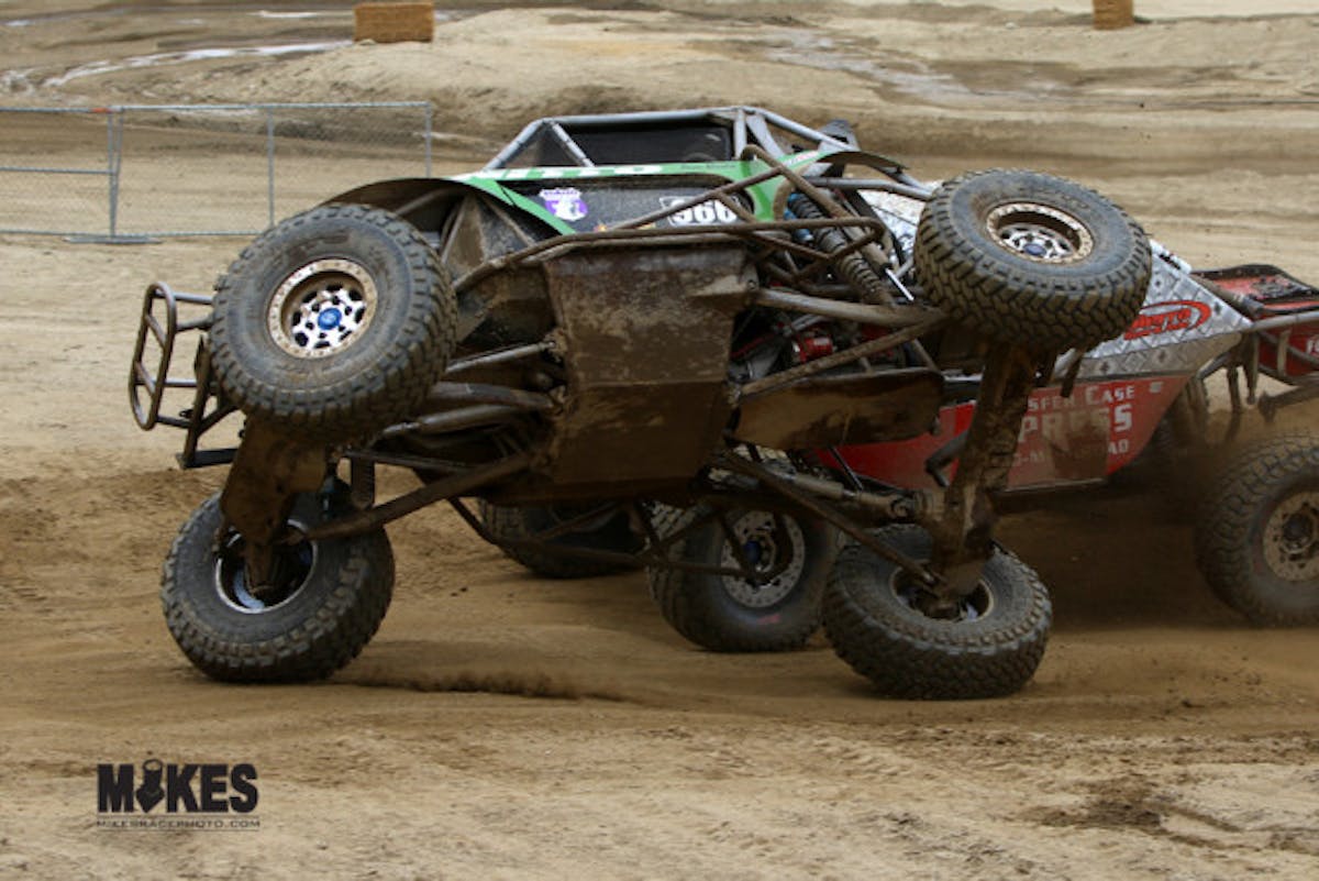 Jason Blanton regains control seconds before rolling over on top of Mike Bou.