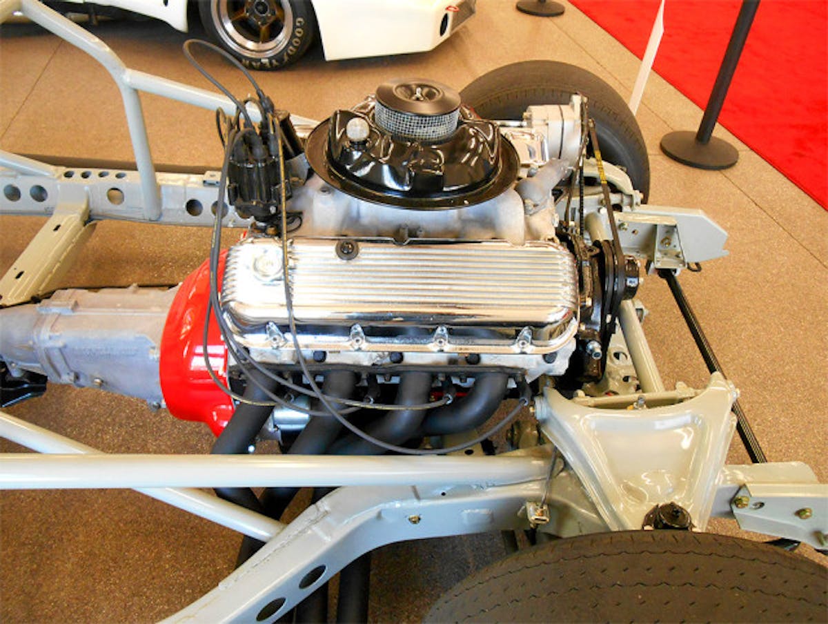 When Fast Phil Currin was finished with his lightening project, even the upper control A-arms were drilled. This seriously weakened the A-arms so Smith installed unaltered production A-arms. Note the triangulation tubing that ties the roll cage to the front of the frame. Photo – K. Scott Teeters