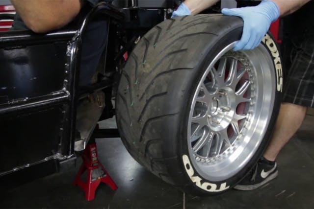 You'll need to lift the drive wheels of the car off the ground before getting started on this job, as you'll need to spin the wheels by hand in order to establish the clutch engagement point.