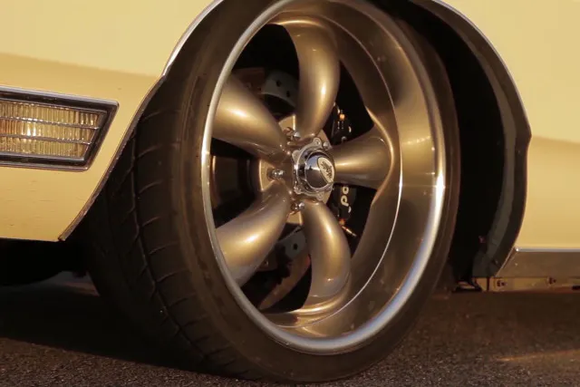 The 20-inch wheels and WIldwood brakes go a long ways to making this a mob boss's car. 