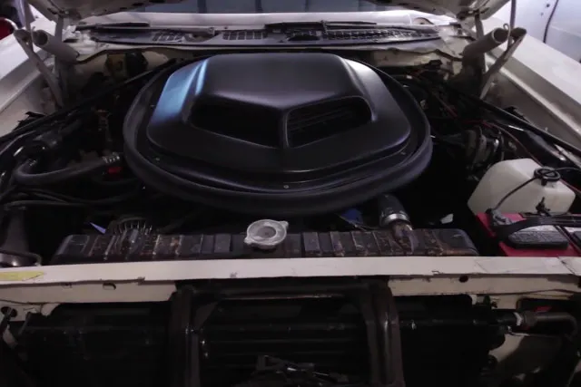 The 360 Dodge put in the Monaco isn't the same one that went into Chargers and Challengers. If you're lucky, this one puts out a maximum of 200 HP,and maybe 220 with Danny's functional Shaker hook. 