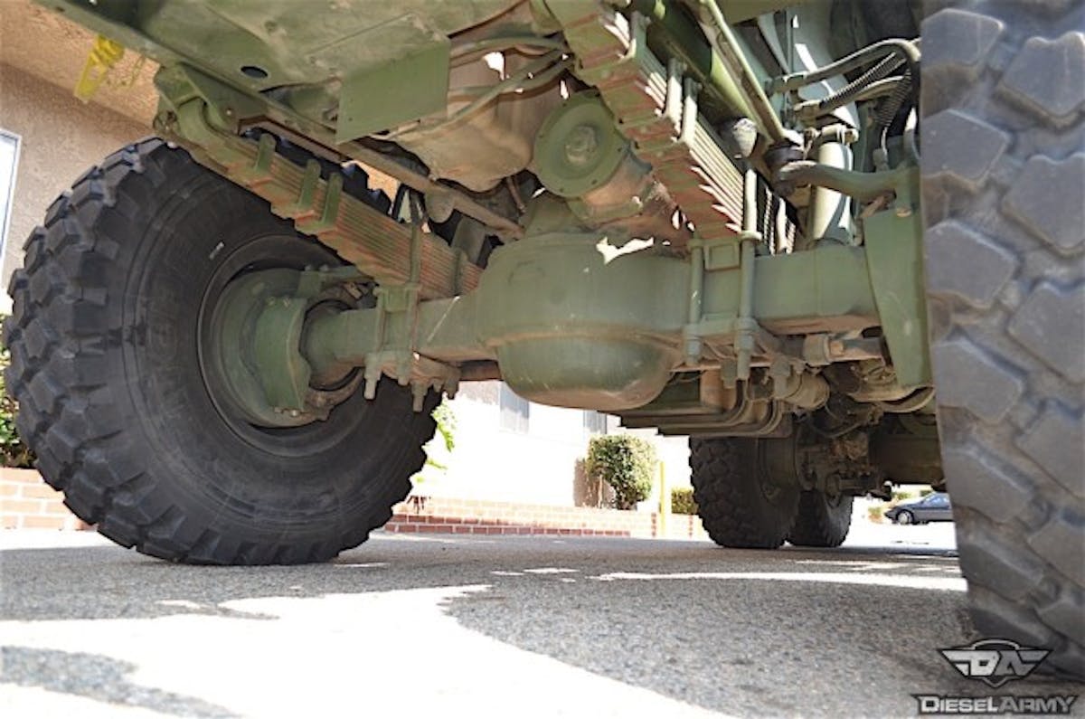 The truck's suspension design consists of leaf spring front end and floating tandem rear axles. Generally full floating designs are reserved for vehicles that are designed for severe duty, or are intended to carry heavy loads. This type of axle uses an axleshaft on each side that is either splined at both ends or splined on the inner end and has a drive flange on the outer end. 