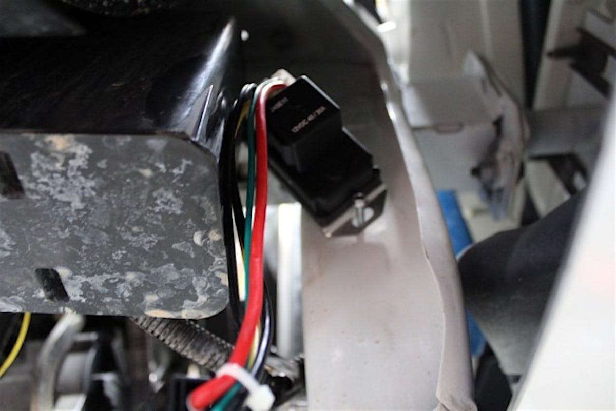 We found the easiest way to wire the new setup was to wire the power wire/fan lead (red loose wire) to the positive lead on the battery, followed by the positive lead on the electric fan.