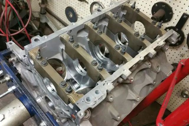 Block assembly begins.