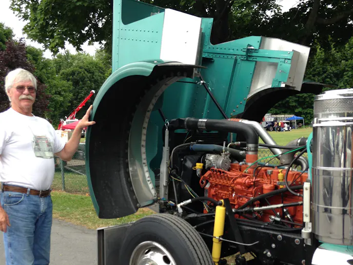 Mr. Hodge opened the professionally looking, but hand made long fiberglass hood.