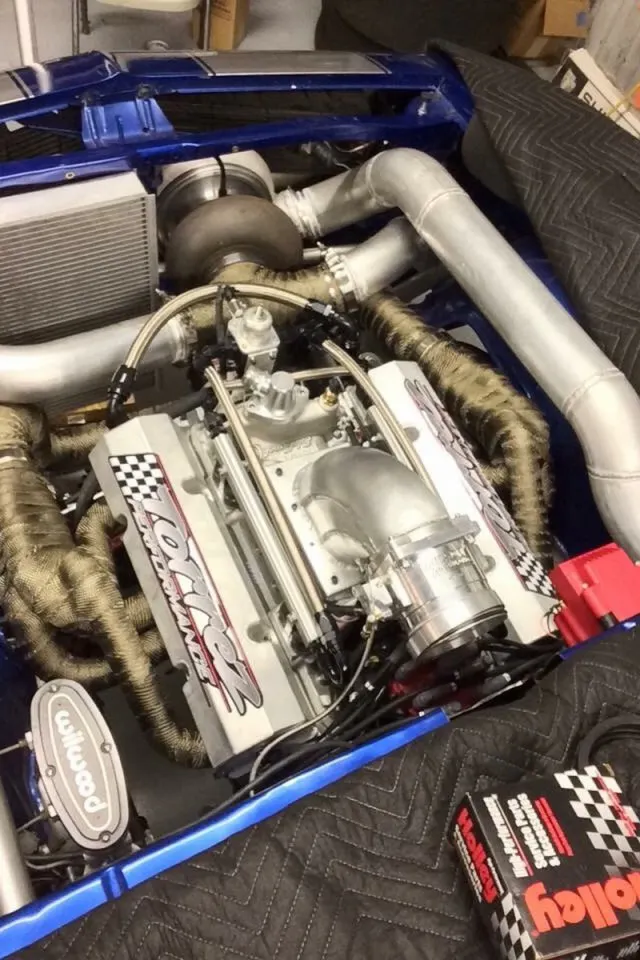 Torrez Performance built the Camaro's 406-inch small block, but Mark's fabrication skills are also found under the hood. He fabricated the intake elbow, turbo piping, and headers for the car, along with the cage, fuel cell, and water tank. 