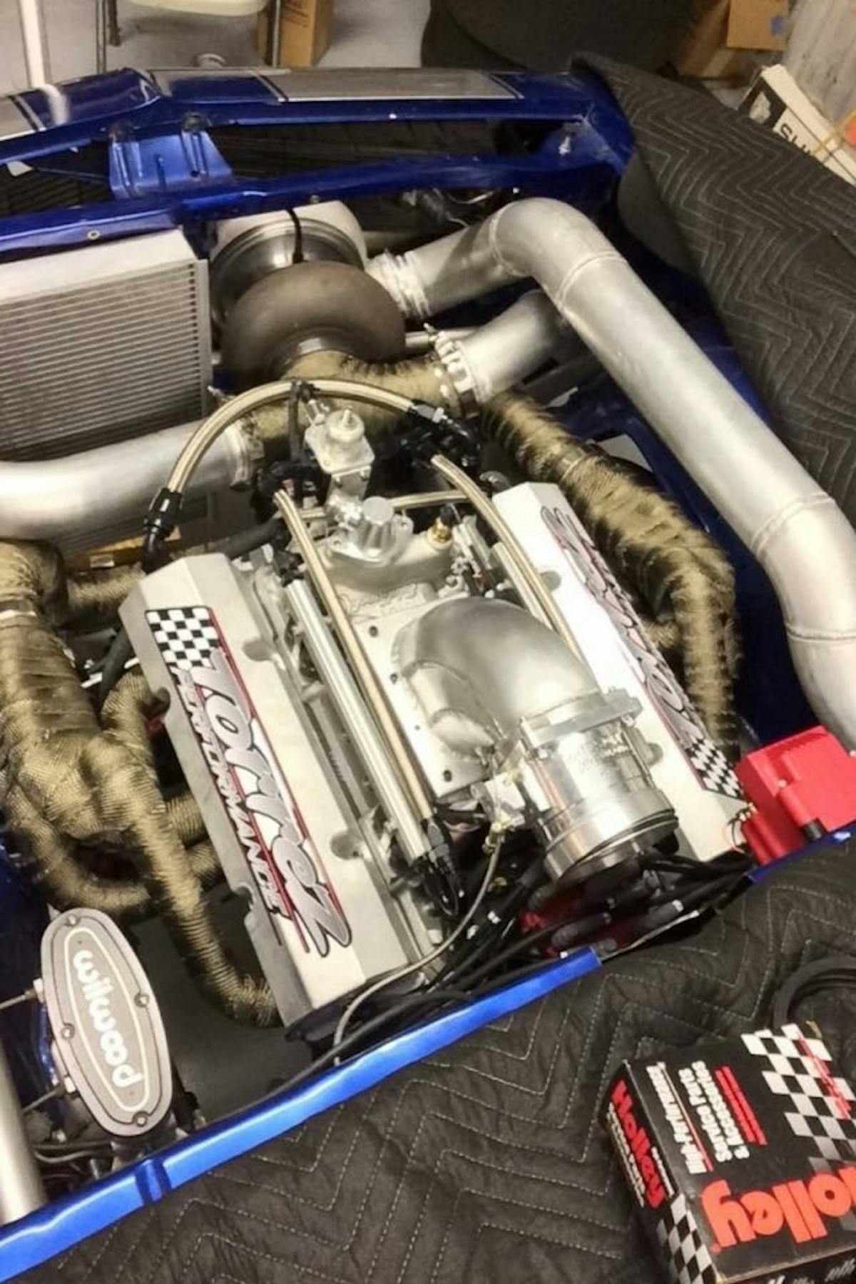 Torrez Performance built the Camaro's 406-inch small block, but Mark's fabrication skills are also found under the hood. He fabricated the intake elbow, turbo piping, and headers for the car, along with the cage, fuel cell, and water tank.