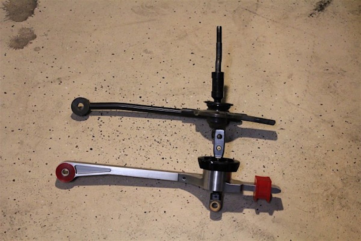 A quick comparison of the factory unit and our new Hurst Billet Plus shifter immediately revealed the massive differences in construction between the two units.