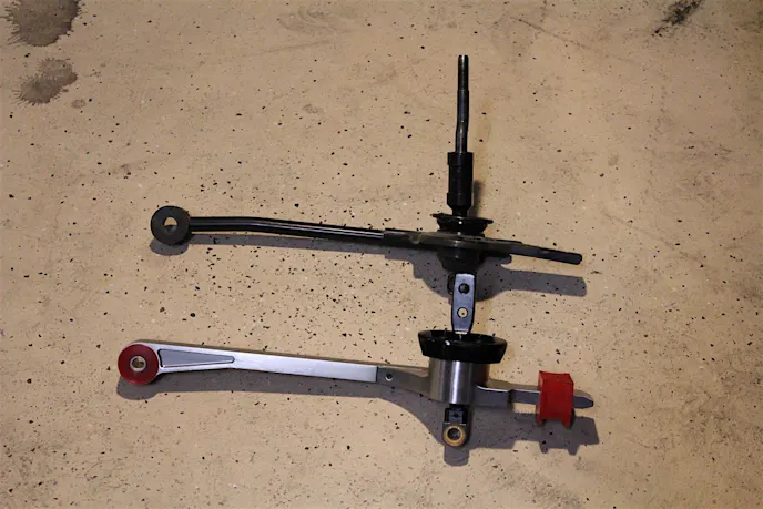 A quick comparison of the factory unit and our new Hurst Billet Plus shifter immediately revealed the massive differences in construction between the two units.