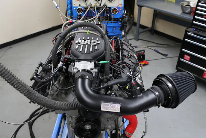 Our budget shootout criteria specified that each motor would run near-stock displacement, roughly 11:1 compression, hydraulic roller camshafts and 91 octance gas on a factory PCM. Getting the Coyote build land in the $9,999 budget cap was tricky, and rather than starting with a new block, we pulled one from a wrecked 2012 F150, as the core components (long block, crankshaft, etc) are identical to those used on the Mustang GT.