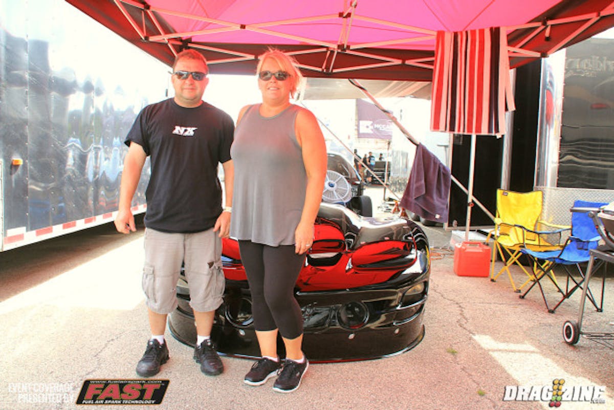 Mike Costick is running a new engine combo for VP Fuels/Wiseco Street Outlaw in 2016 with this being his first event for the year. He is running a 450 cubic inch LSX tall deck engine topped with Frankenstein heads and intake assembled by Mike Duke and topped off with NX Nitrous and backed by a transmission from Chuck Johnson at Finishline Transmissions. Brian Viara is the crew chief and partner with the combo with Costick's son Michael Jr. also assisting with various crew duties. Pictured is Mike and Carey Costick who were just married on May 13 after 5 years together.