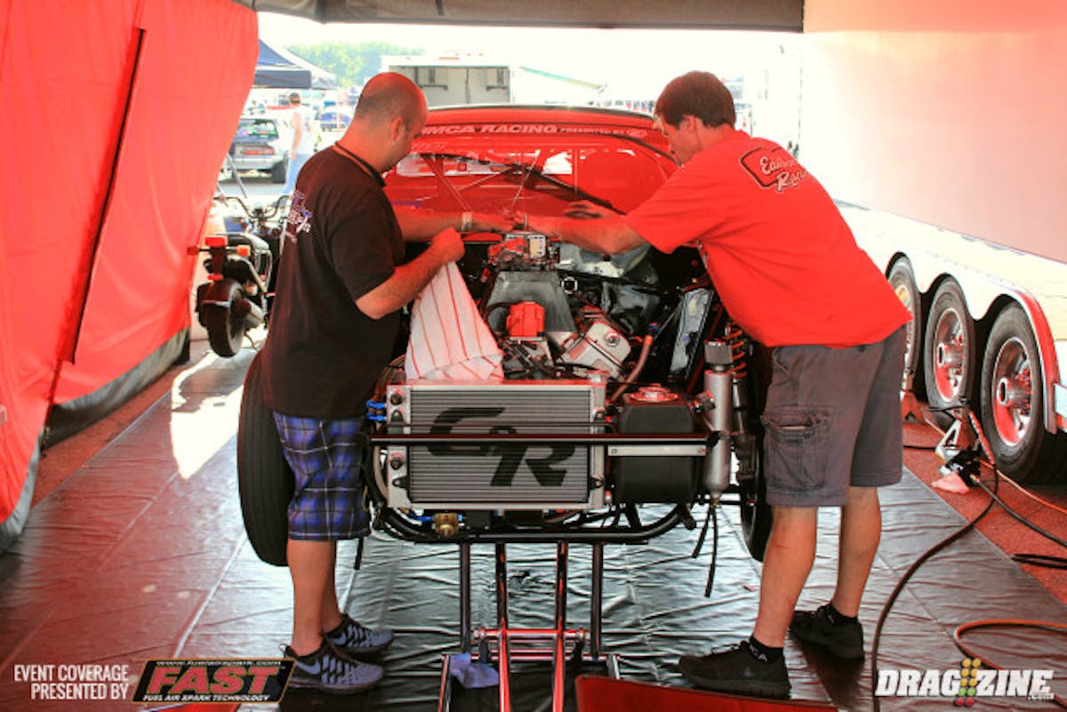 We stopped by Mike DeMayo's pit and caught up with Mike and Gabby Labiosa while they were swapping the carburetor. He sits second in class today with an 8.02 at 168, is last years champion and is second in points this year so far. Things are going well for Team Powerhead.