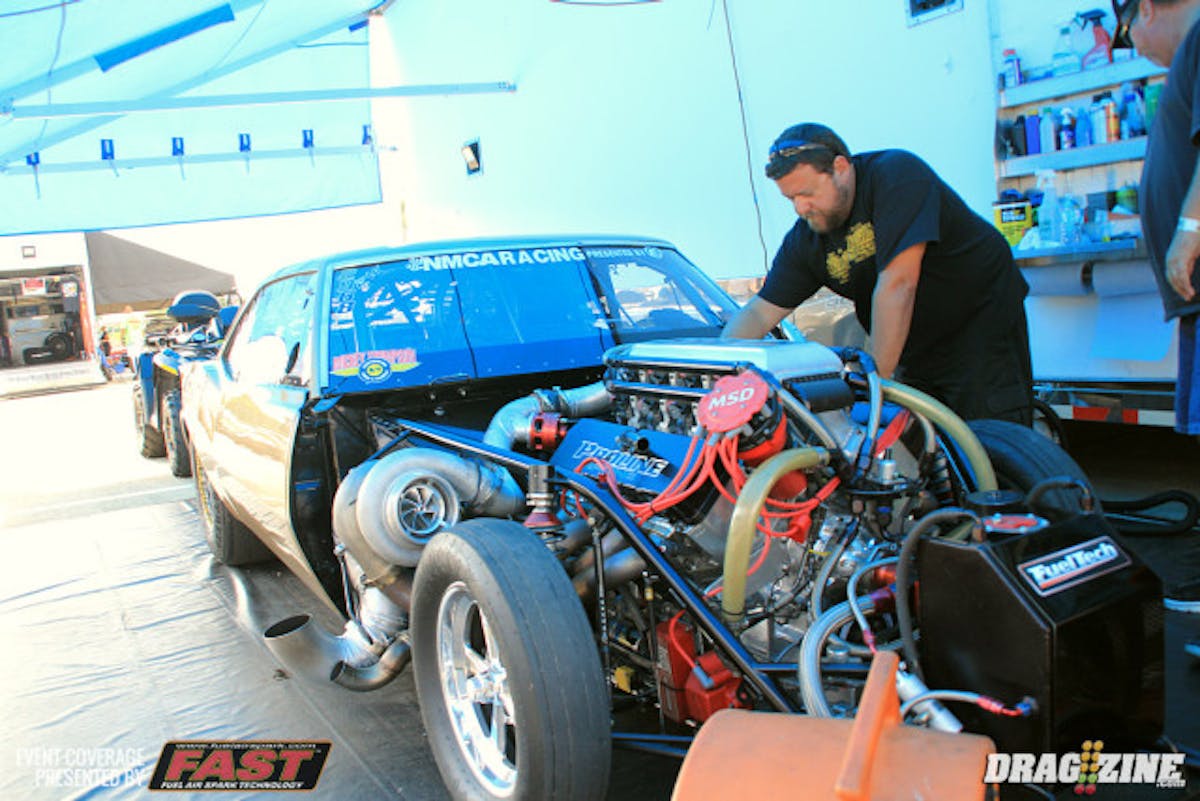 We stopped by number one Radial Wars qualifier Dewayne Mills pit and spoke with Pro Line Racing's Jamie Miller about their day. Since we lost a qualifying session due to rain they put an easy tune in the car putting down a 3.98 at 197 MPH. He has been a best of 3.79 in St Louis and is the quickest turbo charged Drag Radial car and the first boosted car in the 3.70's.