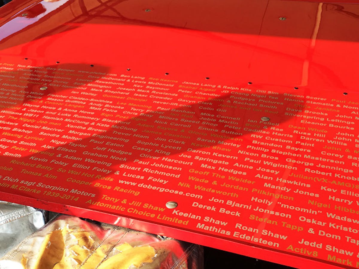 Members and supporters of the Red Victor 5-Second Club, commemorated on the wing of the Red Victor 3 Vauxhall. Photo by Lewis Ffitch