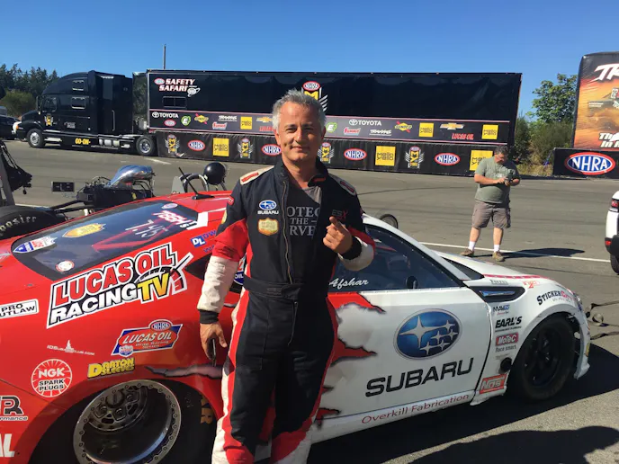 Afshar's smiling face and holding up the #1 sign makes it all worth all of the blood, sweat and tears to accomplish such a feat.