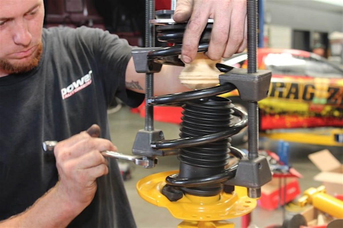 You'll need a spring compressor in order to remove the old springs and install the new ones. If you aren't familiar with using spring compressors this is not something you want to learn by trial and error - those springs are under enormous pressure and can cause serious injury if things go awry during removal.