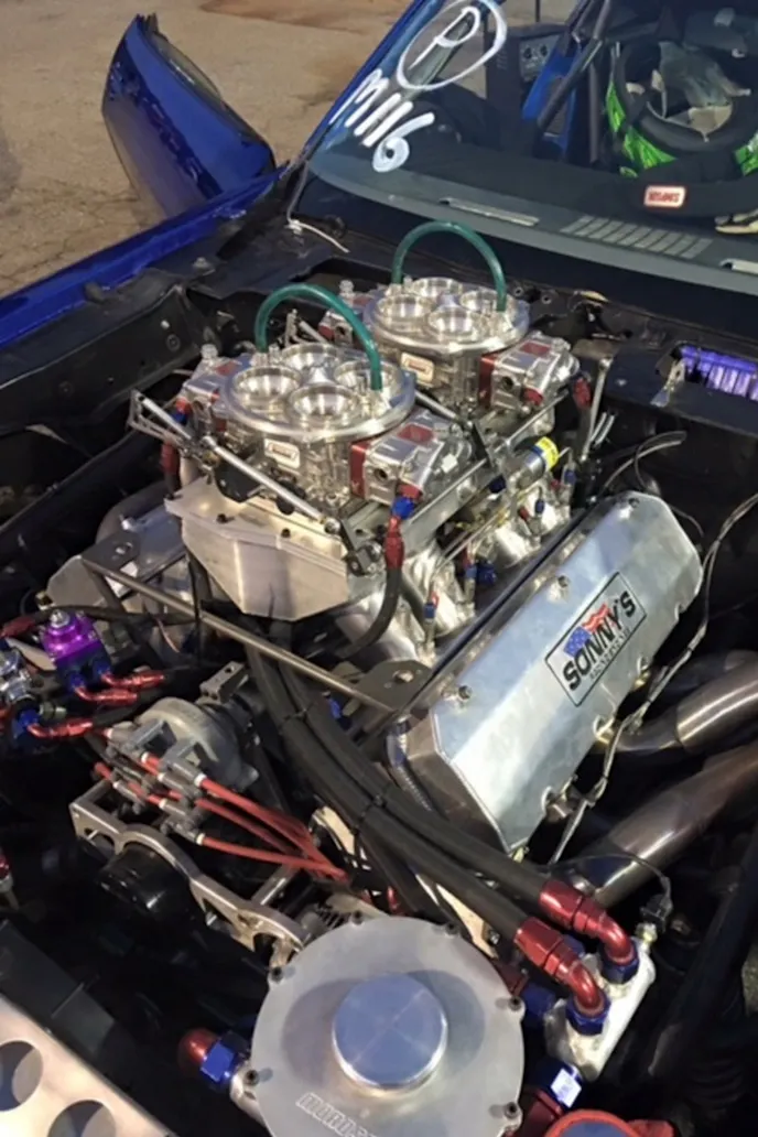 That's what we're talkin' about! That is 632-cubic inches of Sonny's Racing Engines goodness. Throw in 500 more horsepower from a NOS fogger kit, and this is one mean machine. The engine uses Brodix heads, a Sonny's sheetmetal intake, and a Jesel front-mount distributor. The engine also uses a Daily Dry sump oiling system, as well. 