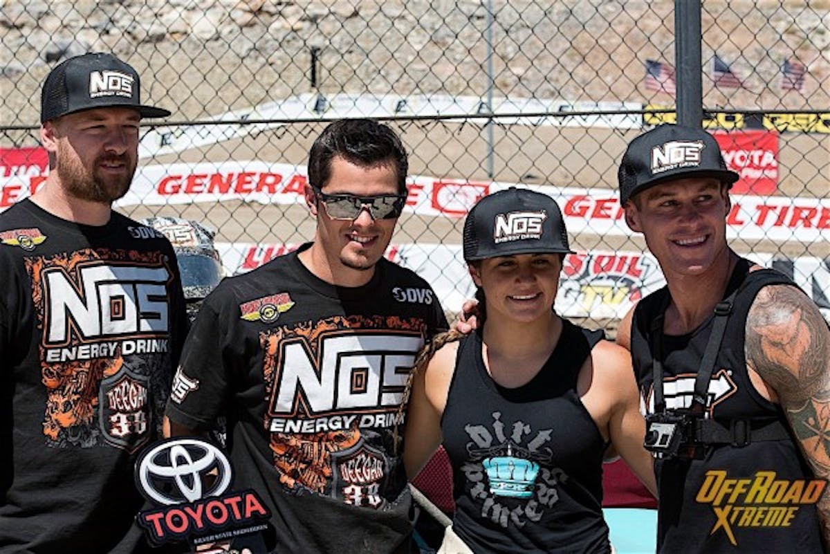 Hailie Deegan and team pose for pictures after racing ends on Saturday.