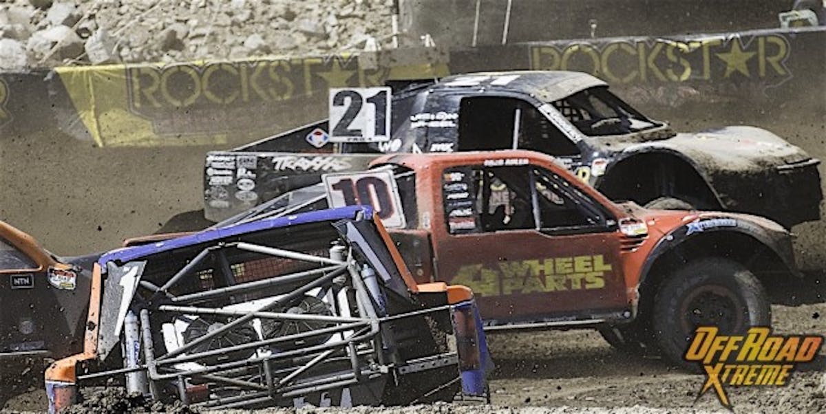 Drivers battle through Turn 2 of the Pro4 race on Sunday.