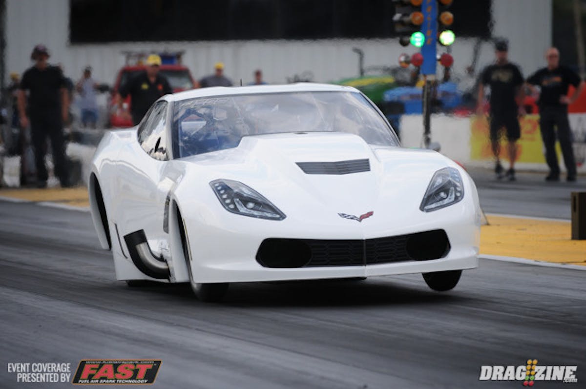 Pro Line Racing's Eric Dillard gets the enviable task of breaking in a state-of-the-art new race car for Sidnei Frigo, as he makes test hits today during index qualifying. Dillard made a solid hit before drifting out out toward the centerline and coasted to a 4.11.