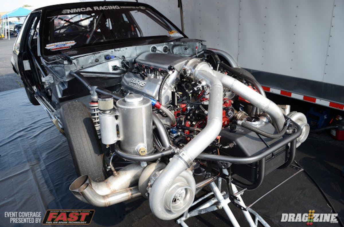 Kentucky native Marty Stinnett got the radial tire world talking during qualifying when he unloaded a 3.929 at 188.94 mph from his small-block powered Mustang, which ultimately held on for the top qualifying spot in Radial vs The World. Stinnett is running the 440-inch mill out of his 275 Radial car that was damaged in a crash and has paired it with a set of 94mm turbos. Stinnett says he and hi team have been working to line out the combination and came into this weekend with a goal of running in the low-4.0's, and was grinning ear to ear when the car went 3.97 on Thursday night. Stinnett says he received a call from fellow small-block runner Keith Berry to confirm that his number is now the small-block radial tire world record, by just under a hundredth of a second.