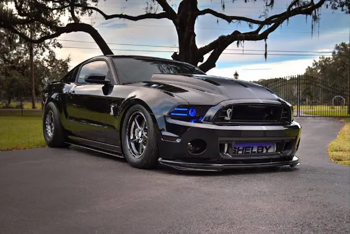 Scofield not only owns that sinister all black '14 Shelby GT500 that's been all over the internet; he also owns an equally badass '16 Shelby GT350 too (and it's the first one to be ProCharged, so we've been told).