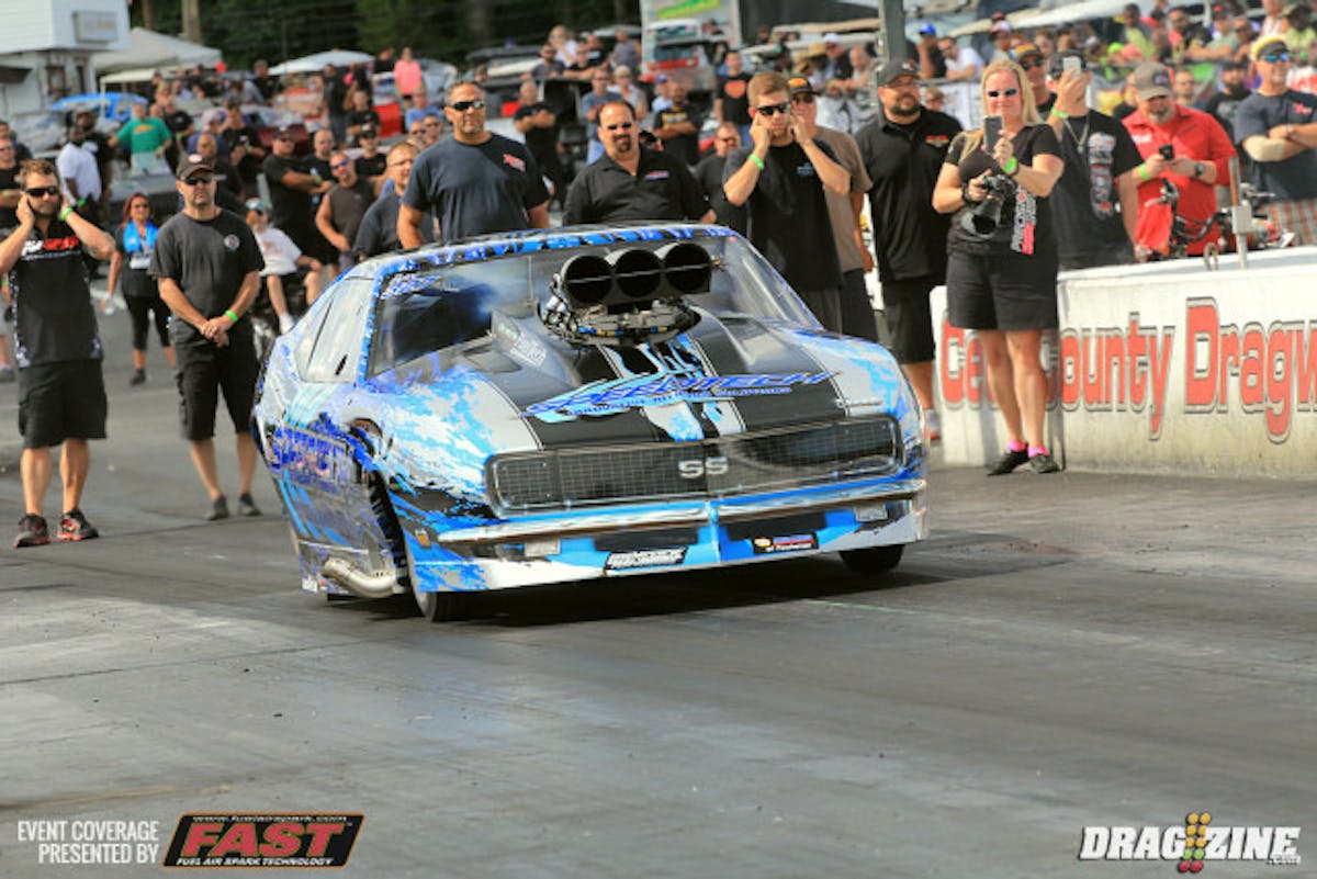 Brian Shaw has his new car on the property with James Hancock behind the wheel this weekend. They were working with the Fuel Tech engine management yesterday and didn't make any runs. The car looked strong to half track on this run, clicking early to a 4.50 at 136.