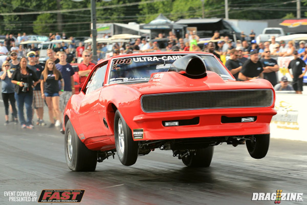 Ron Rhodes wheelied some but pedaled it down saving the run and the car. He clicked it early for a 4.70.