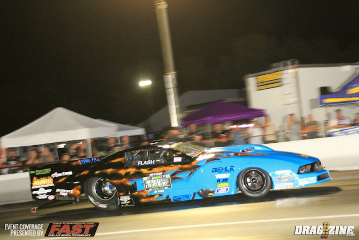 Kevin "Flash" Fiscus sits second in Pro Mod with a 3.78 at 210.11, good for high MPH this session.