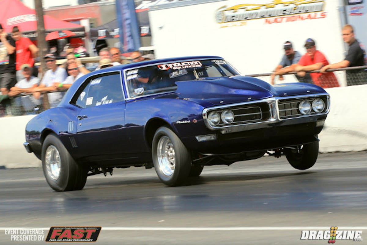 Jeff Kinsler took a hard loss to Tony Mullin in Ultra 275 with both cars struggling and falling way off pace. Kinsler was away first by a wide margin but slowed to a 5.91 at 140  as both cars fought for traction. Mullin's 5.66 would earn his way to round two.