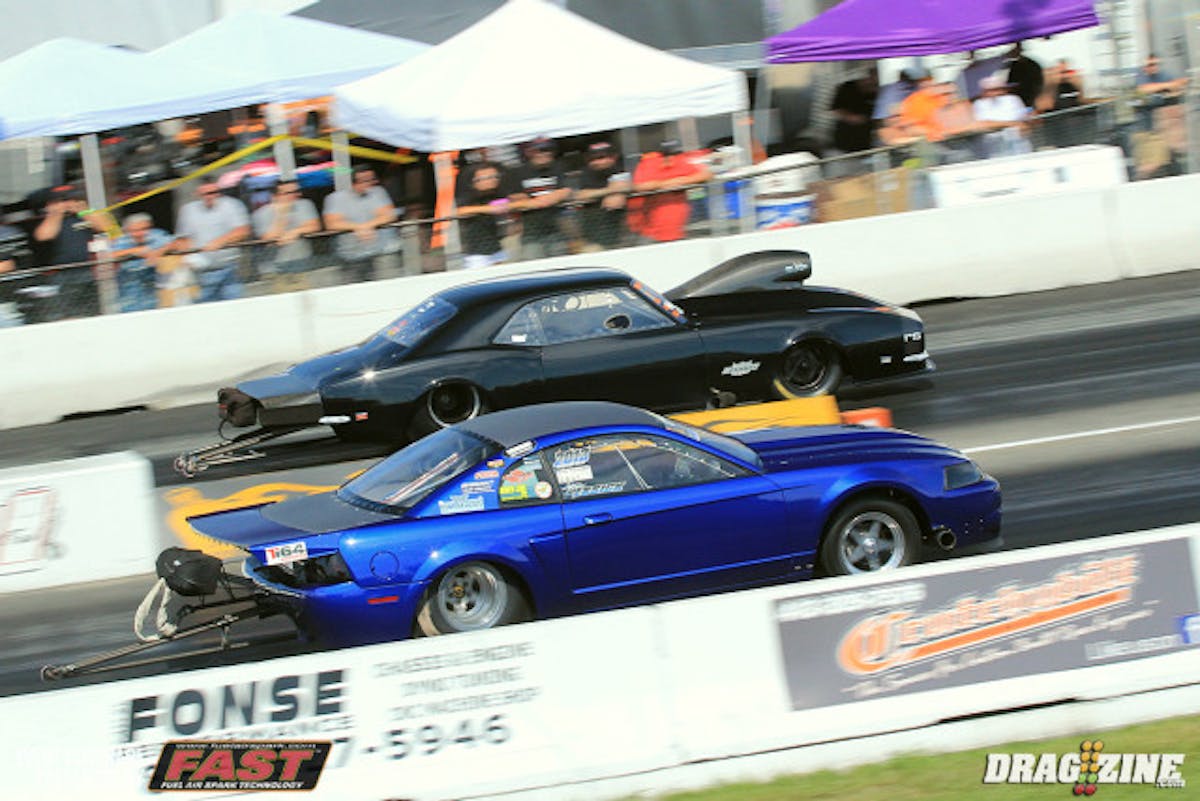 Tim Essex (near lane) faced off with Jerry Mitrovic who took the hole shot. As Essex' turbos brought in the boost the car got on the bars lifting the rear tires forcing him to leave and Mitrovic to earn a berth to round three with a 4.13 at 187.