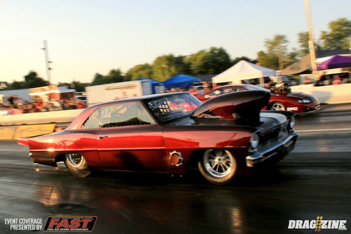 Joe Albrecht had lane choice vs John Bartunic taking the left lane in a nitrous vs blower, radial vs slick match. The drivers had near identical reaction times with Bartunic getting the nod by .002. Albrecht ripped off another 4.00 pass to Bartunic's game 4.15 at 176.