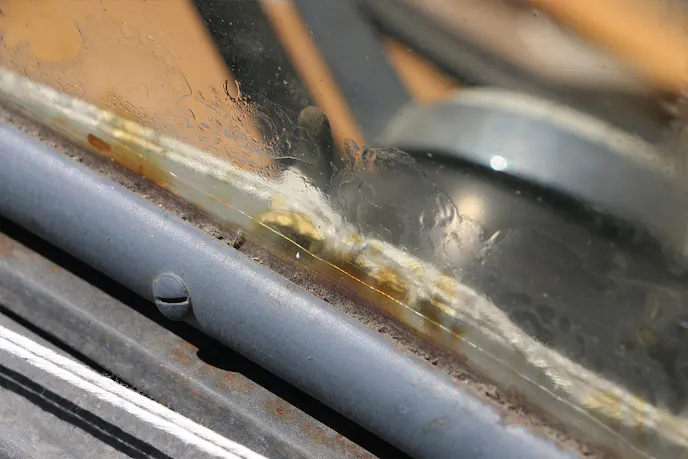 Prior to the invention of PVB, the cellulose between the layers of glass would discolor and deform.