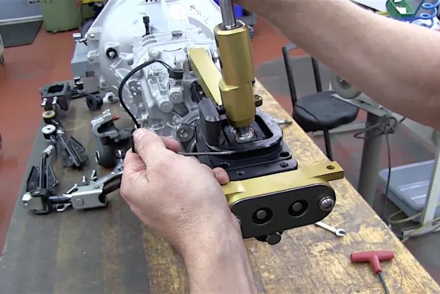 The two pins located on the new MGW MT-82 shifter were there prior to the installation, but they're not so easy to adjust once they've been loosened.