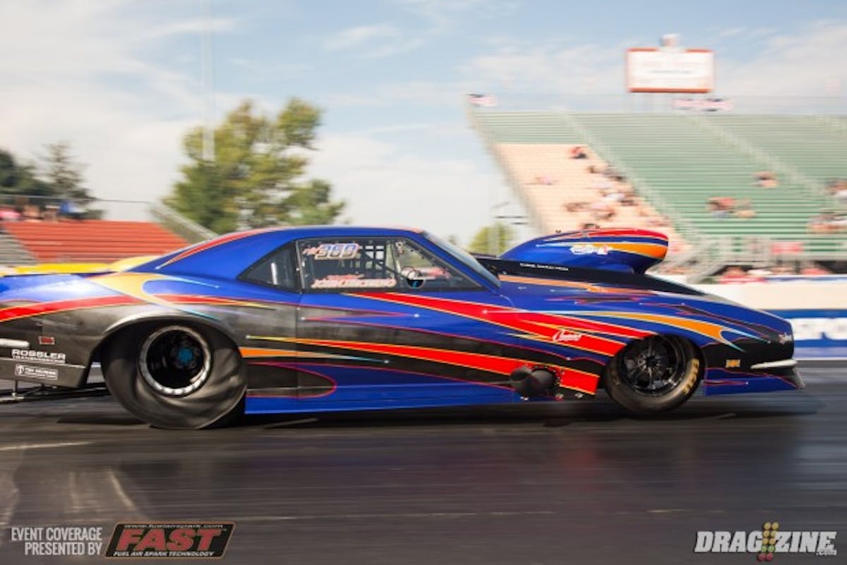Number two qualifier John DeCerbo got the win in round one of Outlaw Pro Mod, but had his hand full with number 23 qualifier Doug Blowes. DeCerbo was trucking along until just past half-track, when he experienced a massive nitrous backfire that nearly allowed Blowes to drive around him.