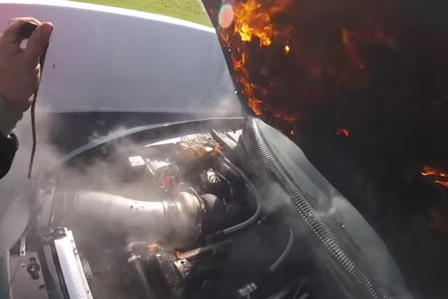 As you can see, the hood was on fire after the head gasket let go, melting pieces falling all over the engine compartment.