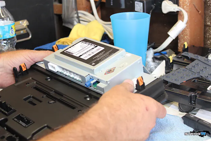 After we reinstalled the green PC board on the new radio dash piece, we proceeded by