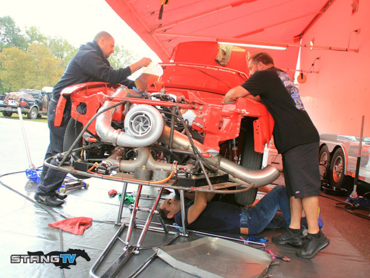 Manny Buginga got here early and made a couple of test hits on Thursday with the second one being a bit off pace. The team set to work going over the car and did and R&R on the transmission and converter. The crew was putting the car back together when we dropped by. Hopefully they have got it sorted out and will be set for round two qualifying on Saturday after today was cancelled to due uncooperative weather.