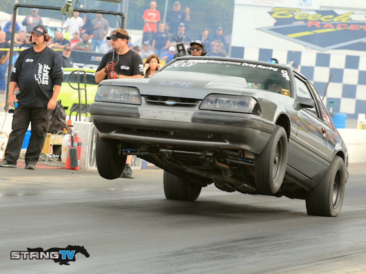 American Racing Headers Factory Stock racer Dan Ryntz pulled a nice wheel stand on his way to a 10.71 at 122 landing third in class so far.