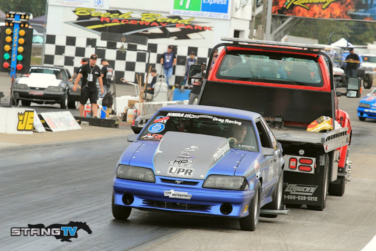 Michael Washington broke his Factory Stock car and it's doubtful he will return after getting towed off the track by the flatbed.