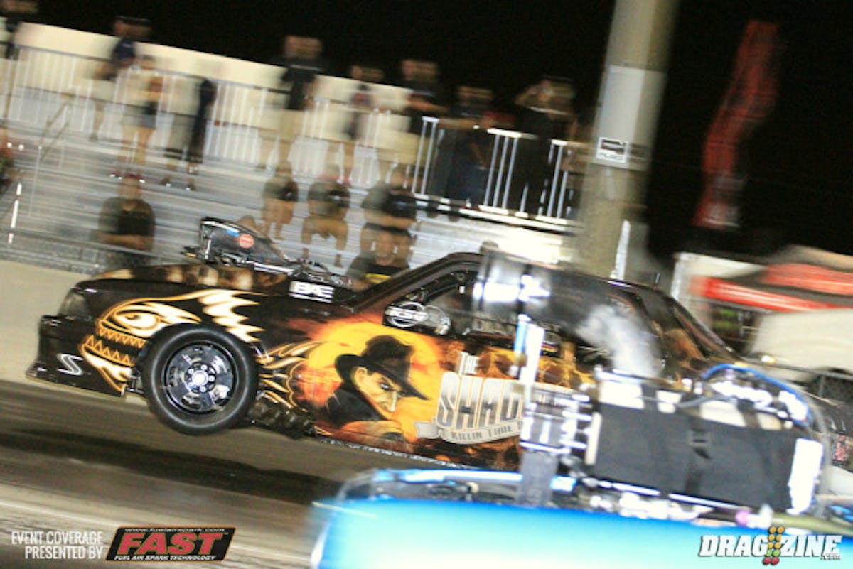 Steve Jackson left hard but climbed the right gear a bit forcing him to lift off the throttle. He costed through to a 4.89 landing thirtieth this session. Marty Robinson near lane.